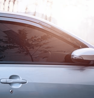 Front right sided of car with tinted window